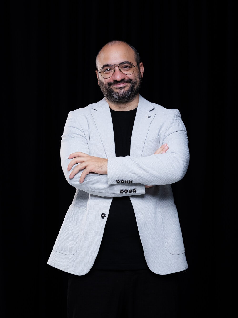 Zak Dakkash speaking at an event