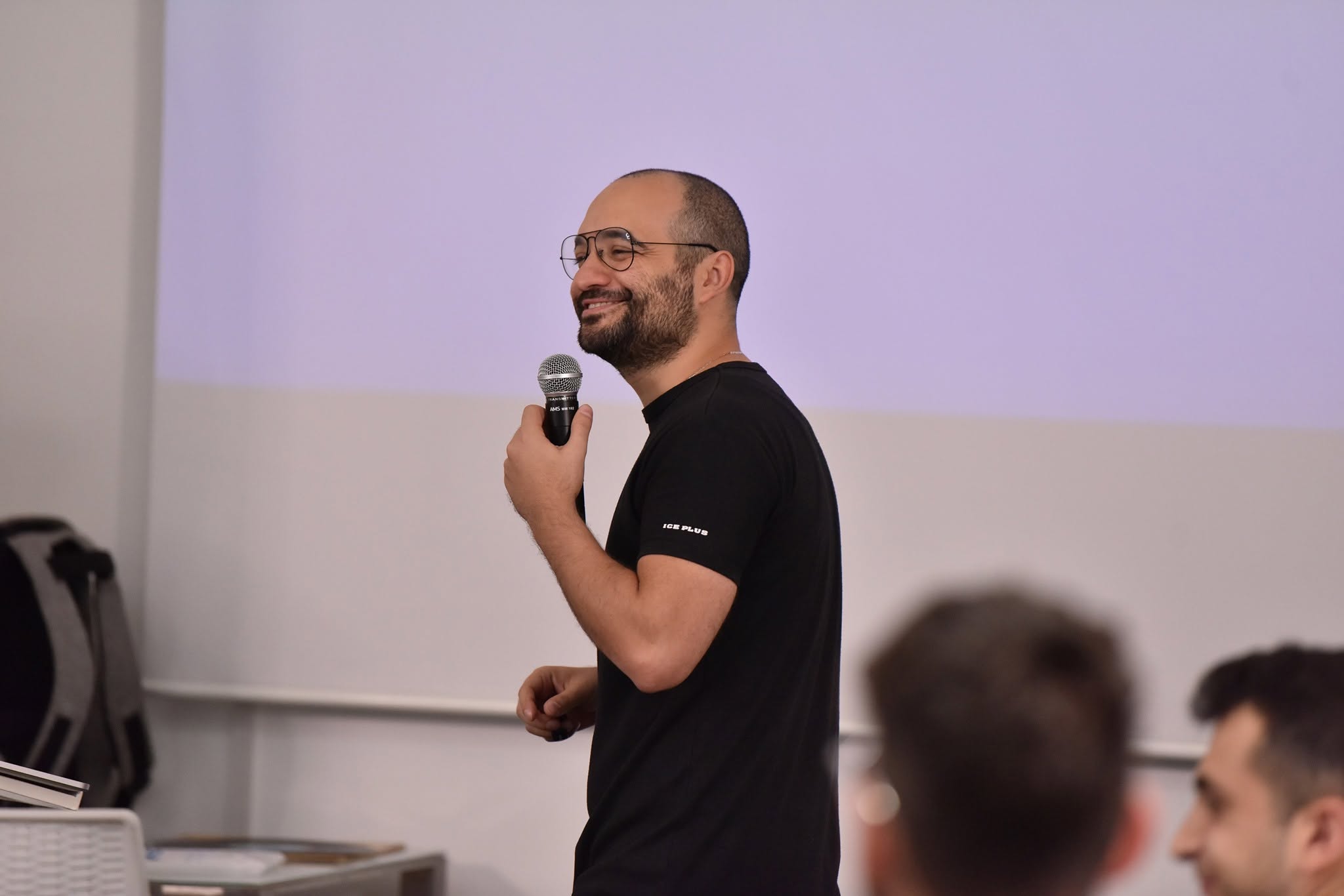 Zak Dakkash speaking during a workshop